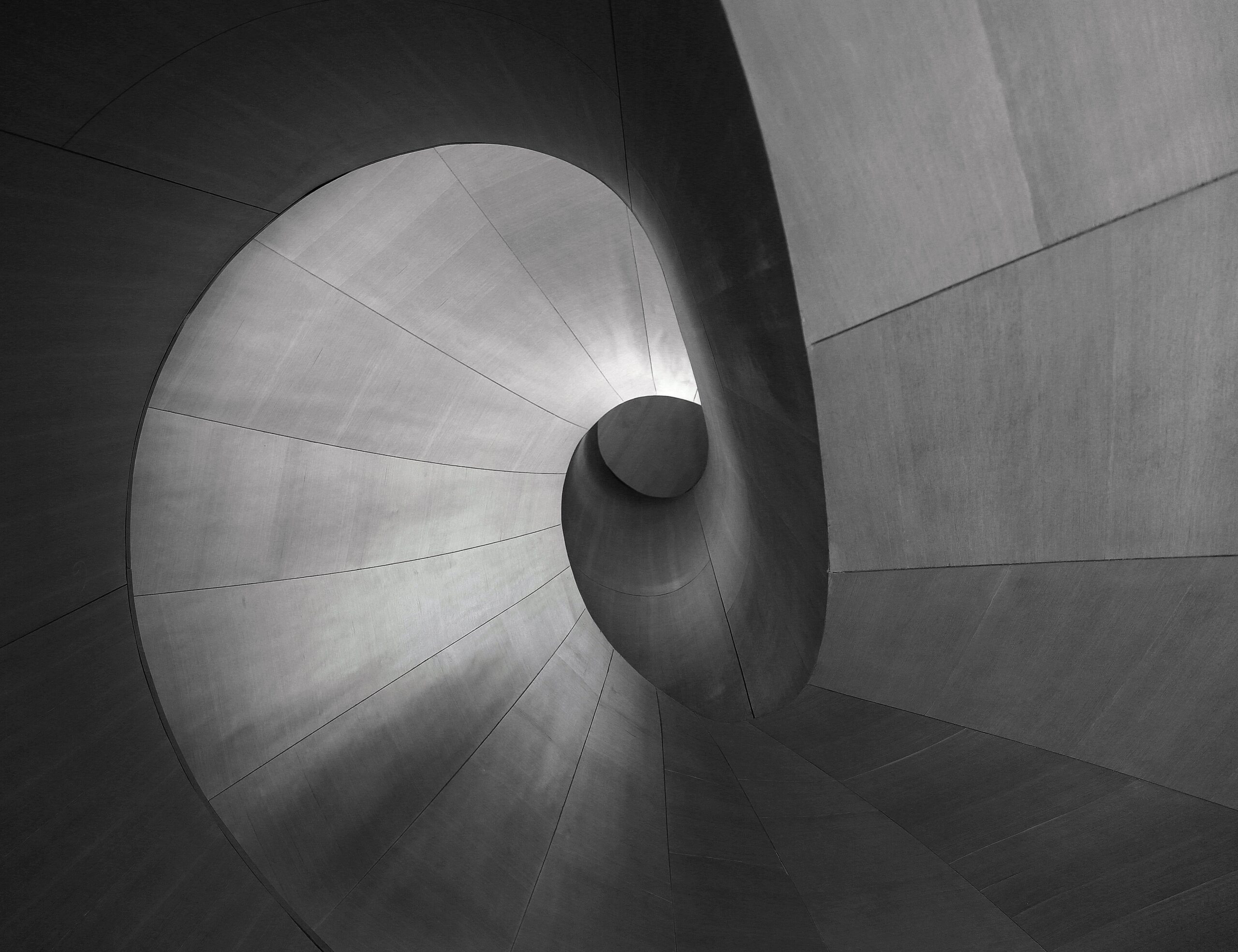 greyscale shot of a unique piece of architecture perfect for a creative background