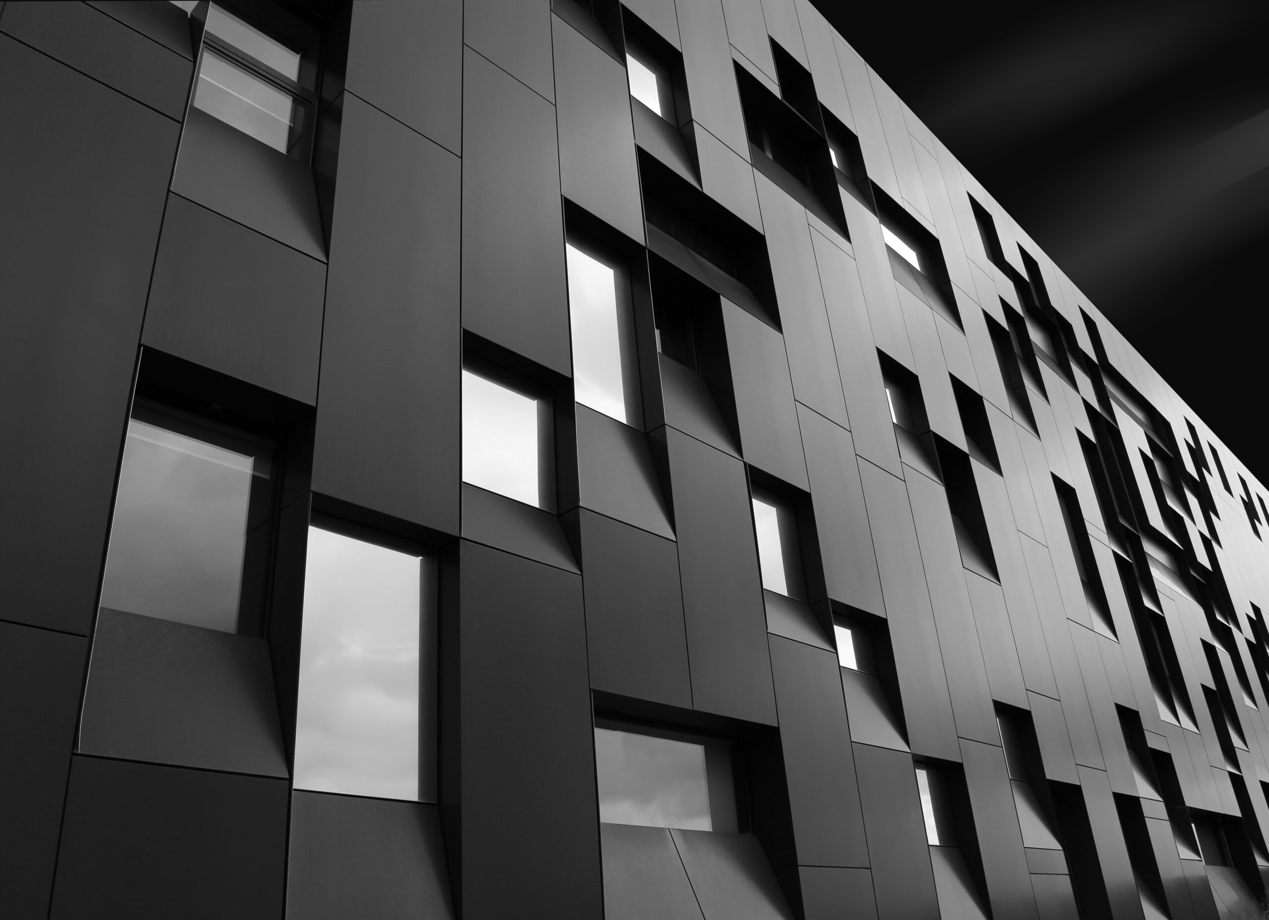 low angle shot of a creative modern building with outstanding architectural twists
